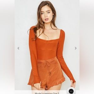 WE ARE HAH DON’T BE SQUARE REVERSIBLE BODYSUIT